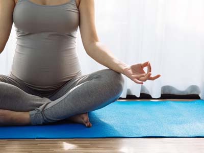 Pregnancy Yoga: Can I Still Attend My Regular Yoga Classes? & Top Tips For  Every Trimester
